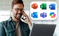 Imagem de homem sentado em frente ao computador, com ícones dos apps do Microsoft 365.